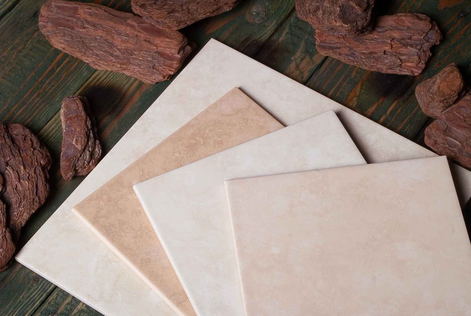 Automated conveyor system with robotic handling for delicate ceramic tiles in a modern manufacturing plant.